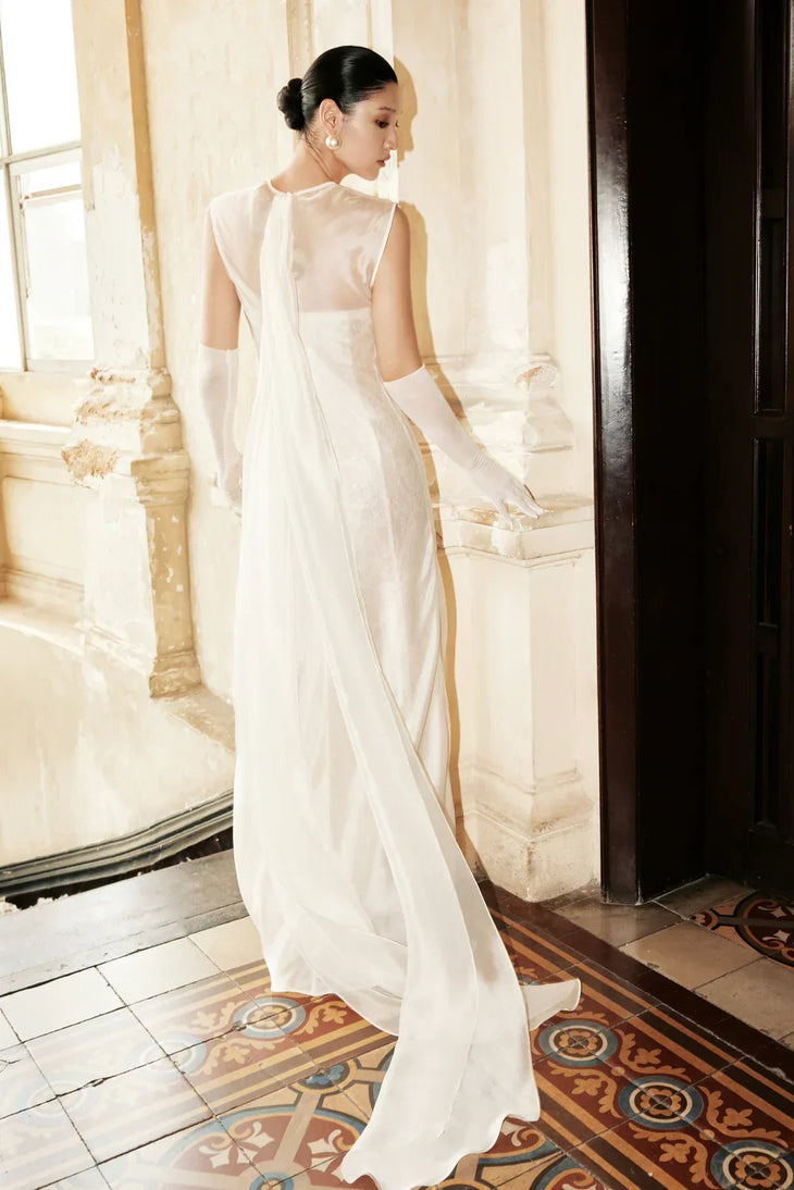 Merrily Dress in ivory silk with sleeveless design and flowing train — Huong Boutique | Endless UAE
