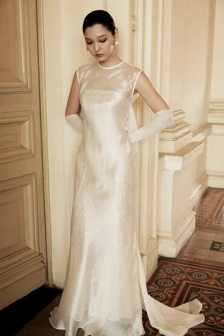 Merrily Dress in ivory crepe with sleeveless design and flowing train — Huong Boutique | Endless UAE