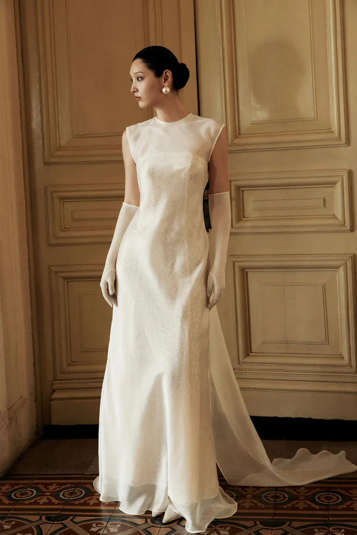 Merrily Dress in ivory crepe with sleeveless design and flowing train — Huong Boutique | Endless UAE