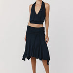 Black halter top and asymmetric skirt two-piece set with wrap details and flared hem — With Jean | Endless UAE