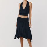 Black halter top and asymmetric skirt two-piece set with wrap details and flared hem — With Jean | Endless UAE