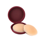Beige silicone nipple covers with burgundy round storage case on white background — Talaa | Endless UAE