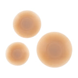 Three beige silicone nipple covers in graduated sizes on white background — Talaa | Endless UAE