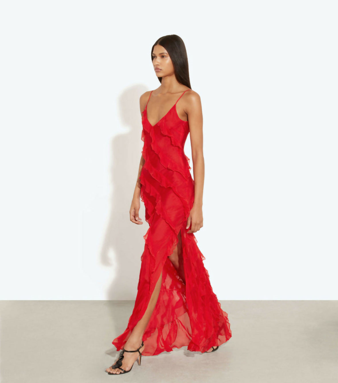 Red maxi dress with spaghetti straps, deep V-neckline, ruffled texture detail, and thigh-high slit — Rat & Boa | Endless UAE
