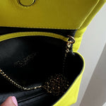 Bright yellow Twister Nano crossbody bag with black leather interior and gold chain strap detail — JW Anderson | Endless UAE