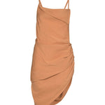 Peach asymmetrical dress with ruched side detail and thin straps — Jacquemus | Endless UAE