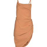 Peach asymmetrical dress with ruched side detail and thin straps — Jacquemus | Endless UAE