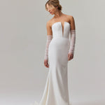 Elegant strapless mermaid wedding dress with plunging neckline and sheer tulle sleeves — You&I Bridal | Endless UAE