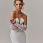 Elegant strapless mermaid wedding dress with plunging neckline and sheer tulle sleeves — You&I Bridal | Endless UAE