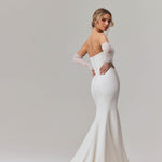 Elegant strapless mermaid wedding dress with plunging neckline and sheer tulle sleeves — You&I Bridal | Endless UAE