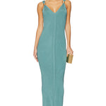 Woman wearing teal ribbed sleeveless maxi dress with V-neckline — Hervé Léger | Endless UAE