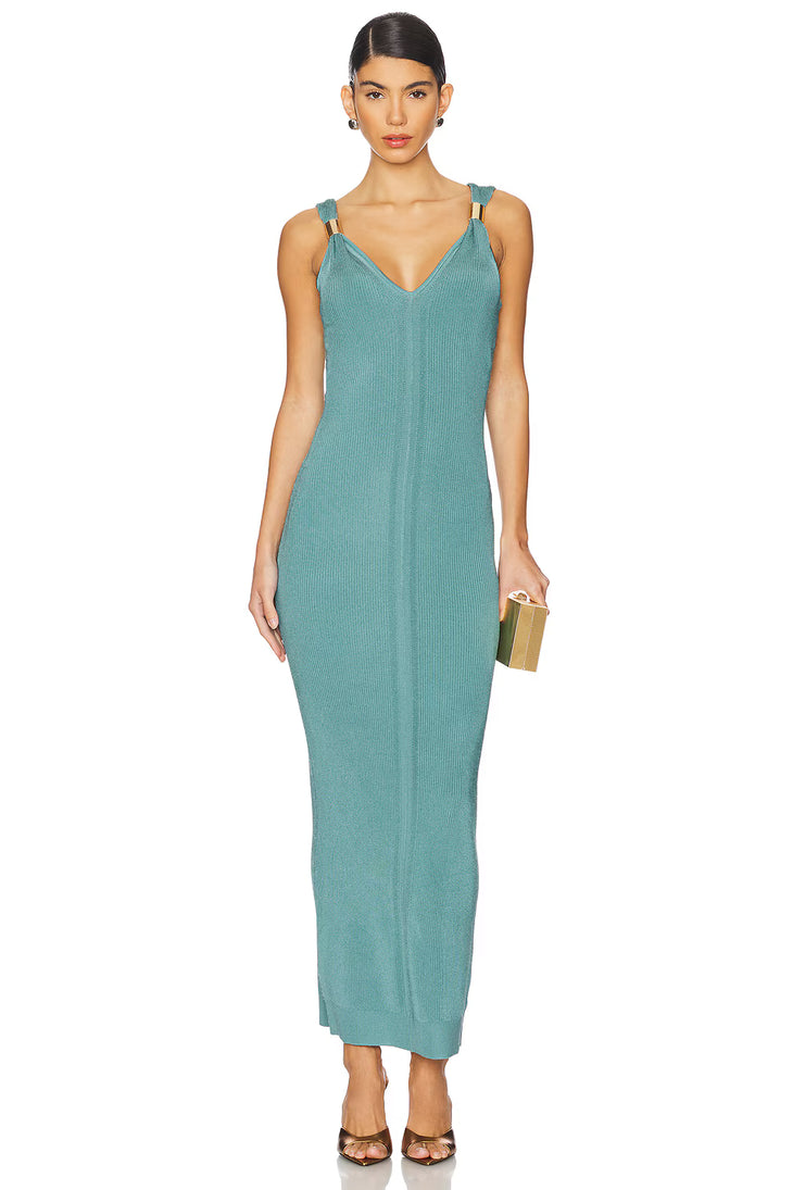 Woman wearing teal ribbed sleeveless maxi dress with V-neckline — Hervé Léger | Endless UAE