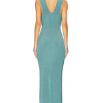 Woman wearing teal ribbed sleeveless maxi dress with V-neckline — Hervé Léger | Endless UAE