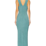 Woman wearing teal ribbed sleeveless maxi dress with V-neckline — Hervé Léger | Endless UAE