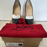 Black pointed-toe pumps with beige leather insole and white tissue paper insert — Endless | Endless UAE