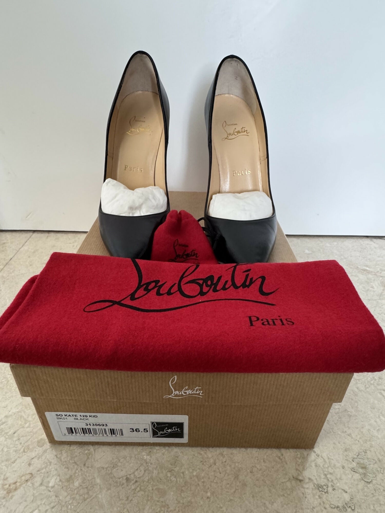 Black pointed-toe pumps with beige leather insole and white tissue paper insert — Endless | Endless UAE
