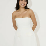 Women's white strapless mini dress with peplum waist detail and structured silhouette — Odd Muse | Endless UAE