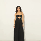 Woman wearing black Legacy Maxi Dress with cutout details and flowing skirt — Anne Louise Boutique | Endless UAE