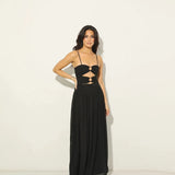 Woman wearing black Legacy Maxi Dress with cutout details and flowing skirt — Anne Louise Boutique | Endless UAE