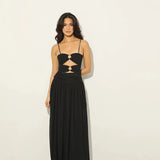 Woman wearing black Legacy Maxi Dress with cutout details and flowing skirt — Anne Louise Boutique | Endless UAE