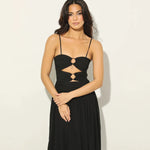 Woman wearing black Legacy Maxi Dress with cutout details and flowing skirt — Anne Louise Boutique | Endless UAE