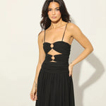 Woman wearing black Legacy Maxi Dress with cutout details and flowing skirt — Anne Louise Boutique | Endless UAE