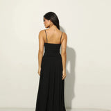 Woman wearing black Legacy Maxi Dress with cutout details and flowing skirt — Anne Louise Boutique | Endless UAE