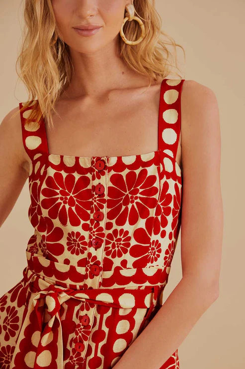 Woman wearing red and cream sleeveless romper with geometric pattern — Farm Rio | Endless UAE
