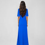 Woman wearing blue Raya Maxi Dress with half sleeves and high slit — ATOIR | Endless UAE