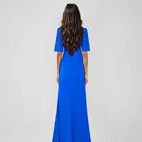 Woman wearing blue Raya Maxi Dress with half sleeves and high slit — ATOIR | Endless UAE