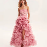 Strapless pink maxi dress with voluminous rose appliqué ruffles and dramatic high-low hemline — Milla | Endless UAE