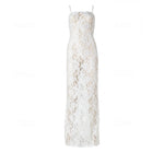 White lace camisole maxi dress styled with accessories in a desert setting — Scorpio Rizing | Endless UAE