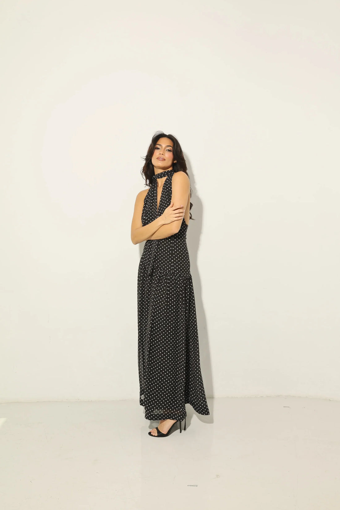 Elegant black polka dot maxi dress with neck tie detail and flowing silhouette — Anne Louis Boutique | Endless UAE