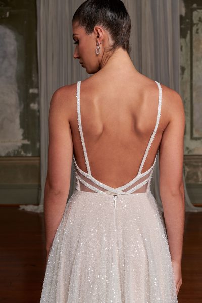 Indy wedding dress with plunging neckline and flowing skirt — Evie Young | Endless UAE