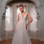 Indy wedding dress with plunging neckline and flowing skirt — Evie Young | Endless UAE