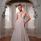 Indy wedding dress with plunging neckline and flowing skirt — Evie Young | Endless UAE