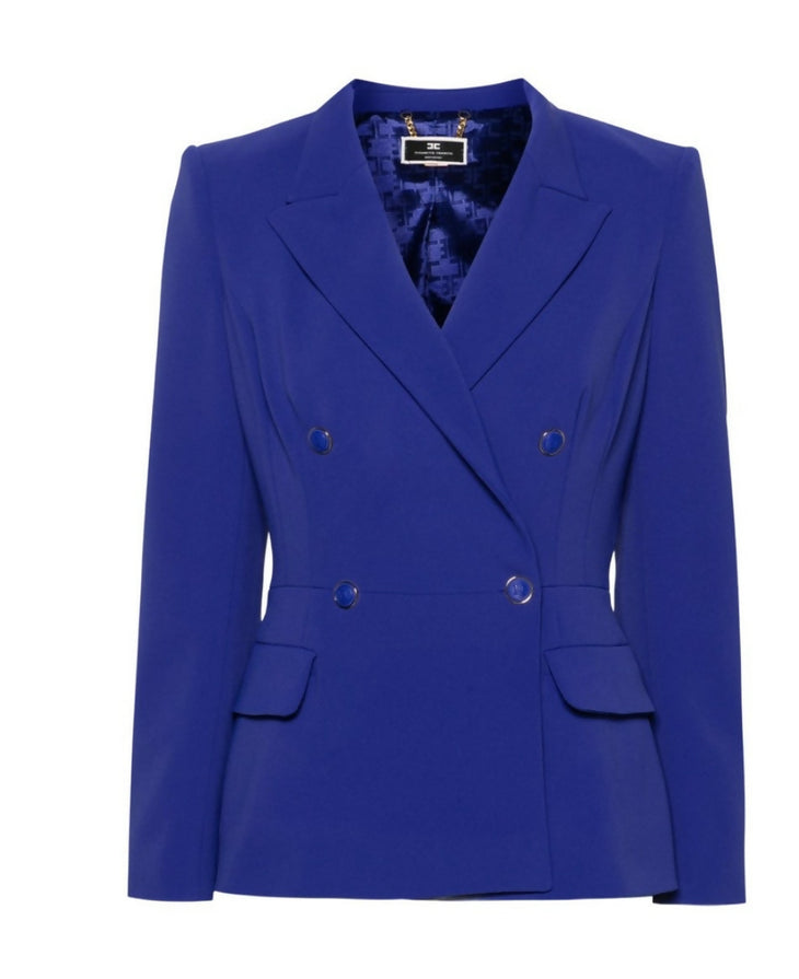 Woman wearing royal blue double-breasted tailored suit with black heels — Elisabetta Franchi | Endless UAE