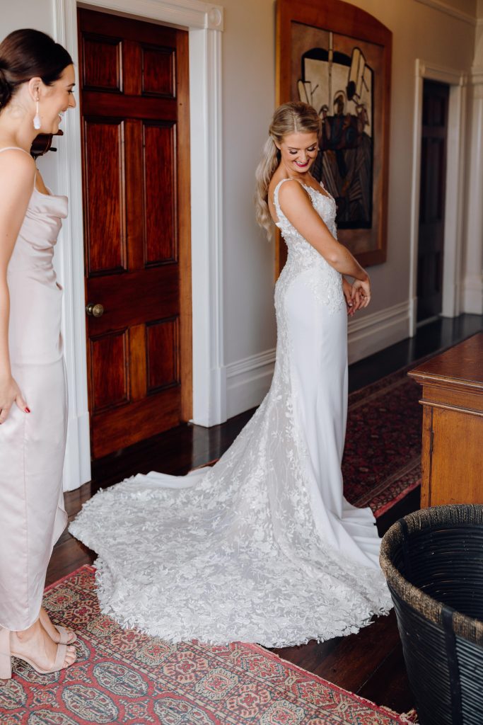 Bride wearing white lace mermaid wedding gown with train — JESSICA COUTURE | Endless UAE