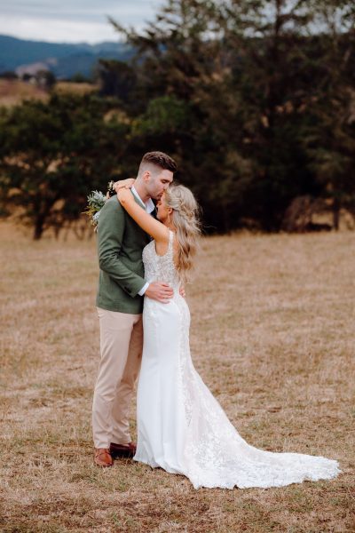 Bride wearing white lace mermaid wedding gown with train — JESSICA COUTURE | Endless UAE