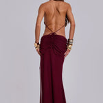 Burgundy halter neck backless maxi dress with draped detailing and gold cuff bracelets — Jaded London | Endless UAE