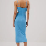 Blue fitted midi dress with thin straps and back zipper closure, shown from behind — Misha | Endless UAE