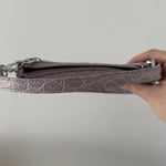 Mini Rachel Lilac Croco Embossed Leather Bag held in hand against white background — By Far | Endless UAE