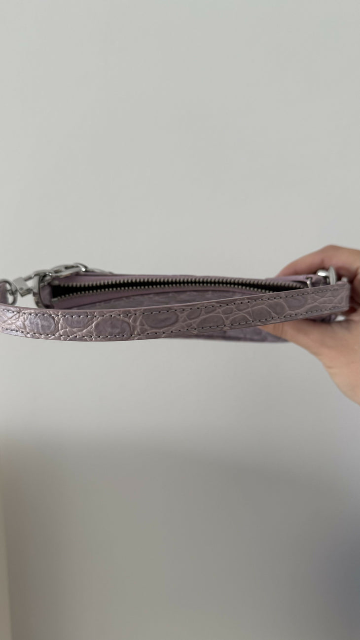 Mini Rachel Lilac Croco Embossed Leather Bag held in hand against white background — By Far | Endless UAE