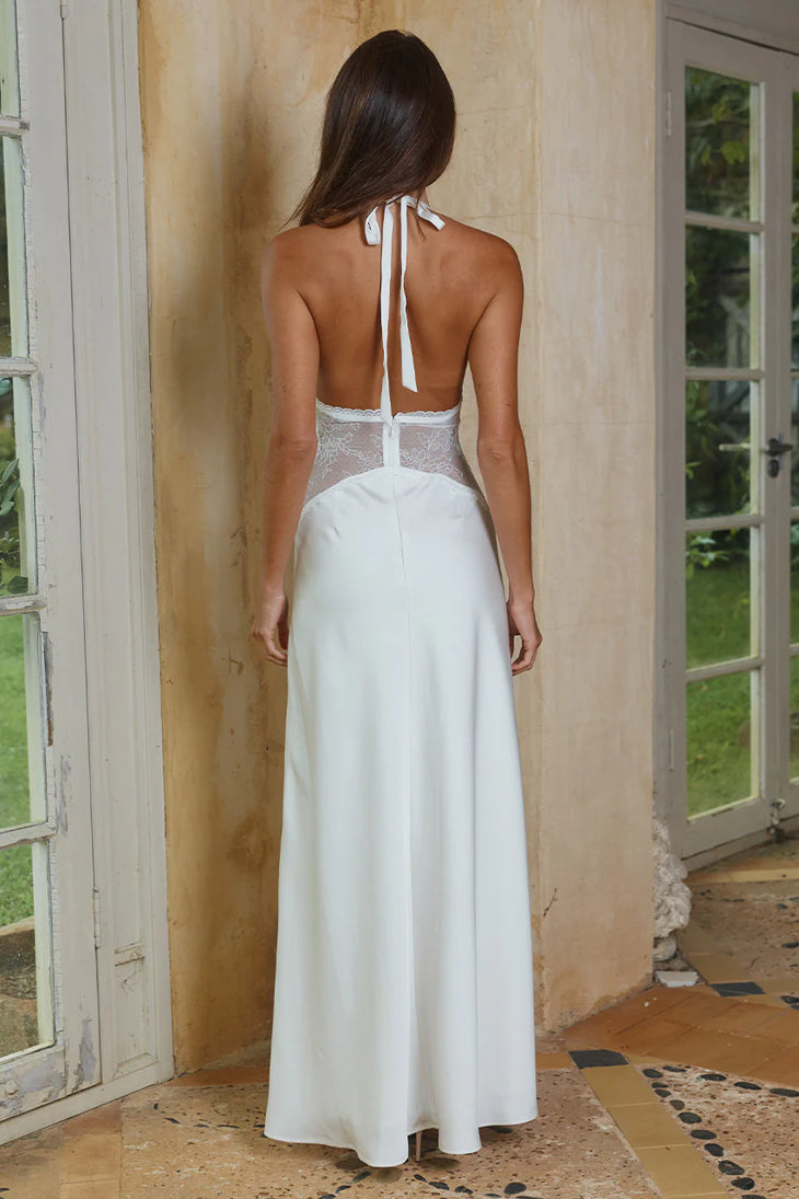 White halter neck maxi dress with open back and lace detail, elegant evening gown — Runaway The Label | Endless UAE