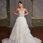 Romantic tiered tulle ballgown wedding dress with beaded corset bodice and spaghetti straps — You&I Bridal | Endless UAE