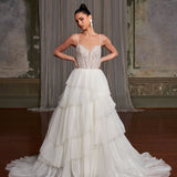 Romantic tiered tulle ballgown wedding dress with beaded corset bodice and spaghetti straps — You&I Bridal | Endless UAE