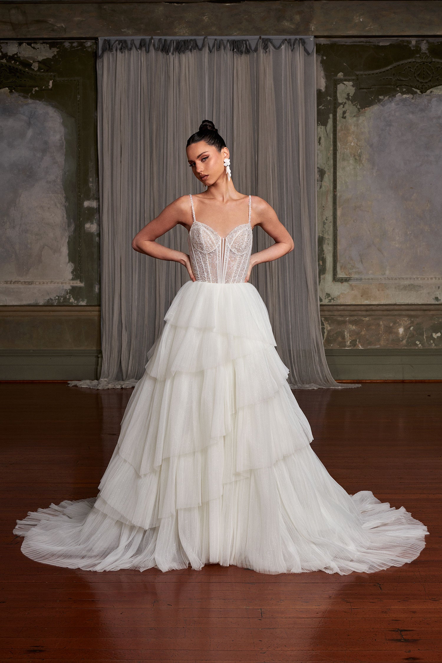Romantic tiered tulle ballgown wedding dress with beaded corset bodice and spaghetti straps — You&I Bridal | Endless UAE