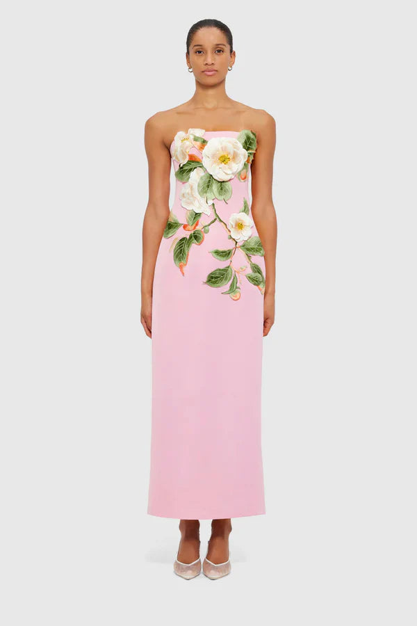 Woman wearing pink strapless maxi dress with white floral appliqué — Leo Lin | Endless UAE