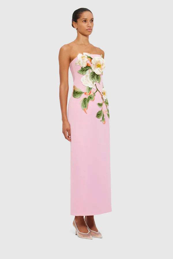 Woman wearing pink strapless maxi dress with white floral appliqué — Leo Lin | Endless UAE