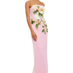 Woman wearing pink strapless maxi dress with white floral appliqué — Leo Lin | Endless UAE
